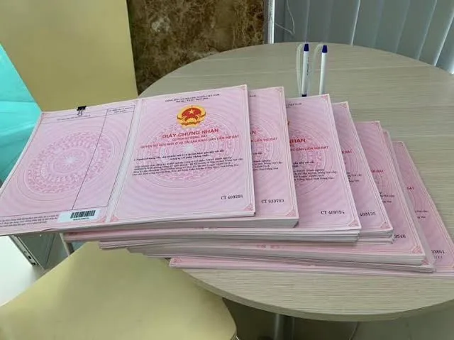 Thủ tục sang tên sổ đỏ cho con